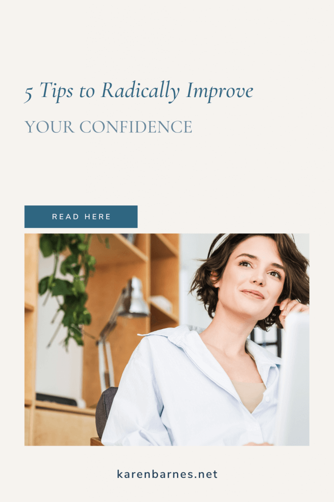 Women smiling at her desk because she has improved her confidence